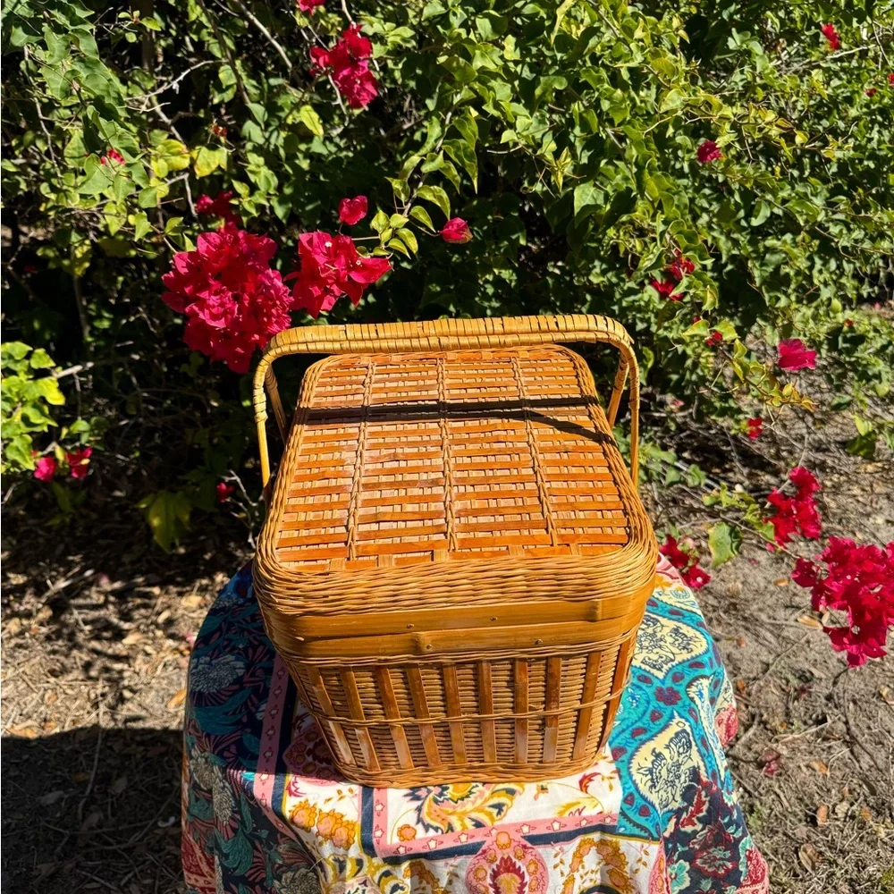 Large Vintage Handmade tan rattan picnic basket with handles.